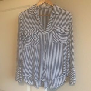 Bell sleeve long sleeve top.  Super cute and flattering.